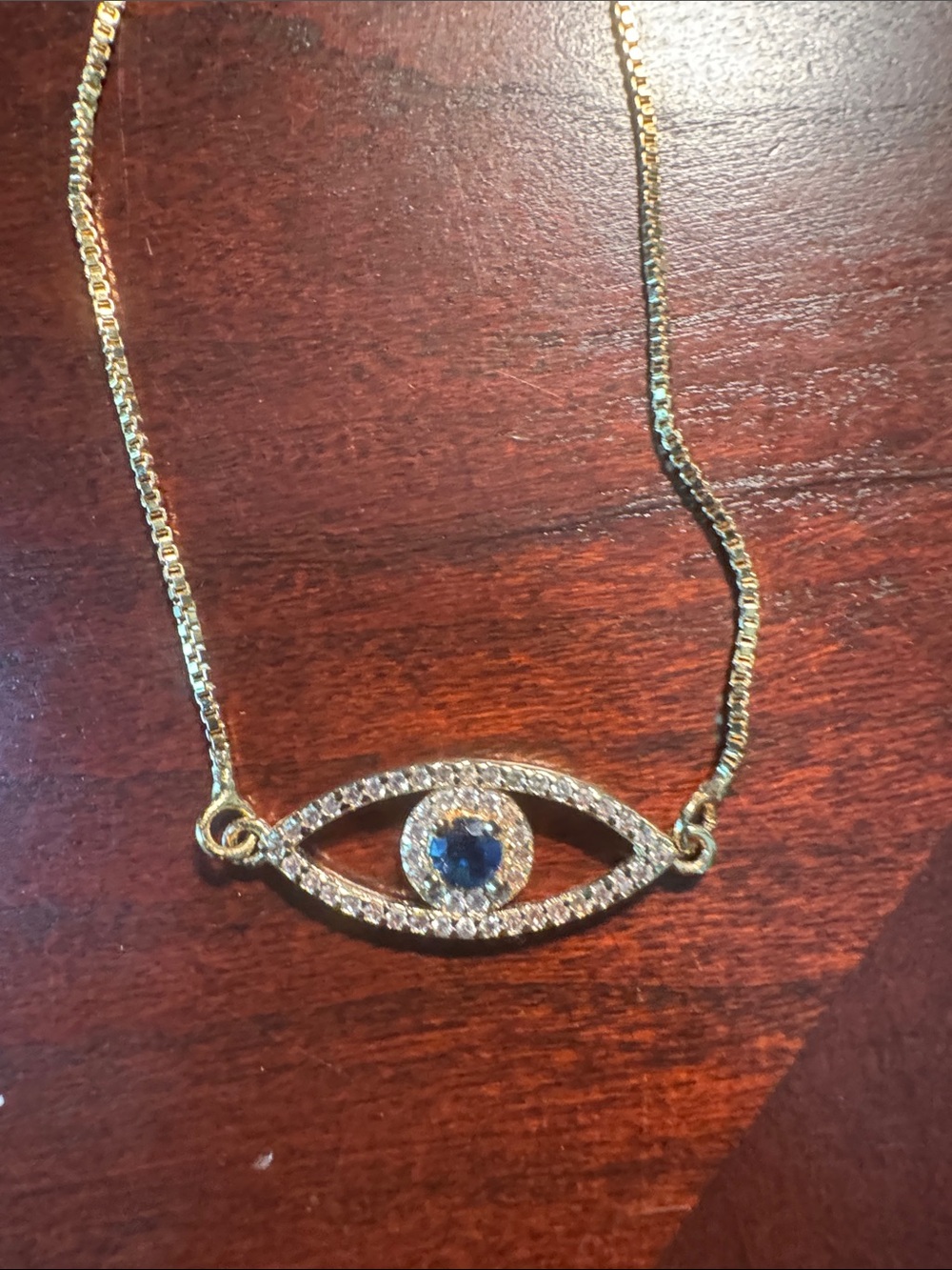 Gold Evil Eye Bracelet with Blue Crystal Accent